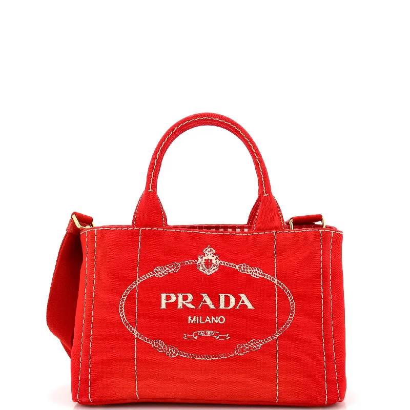 Prada Cahier bags with a monogram - embossed leather surfaceCanapa Convertible Tote Canvas Mini